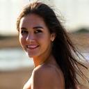 Professional portrait of Aisha M.